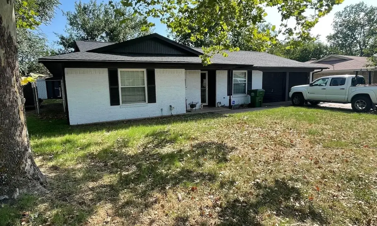 Professional roofing crew working on a residential roof in North Londonderry